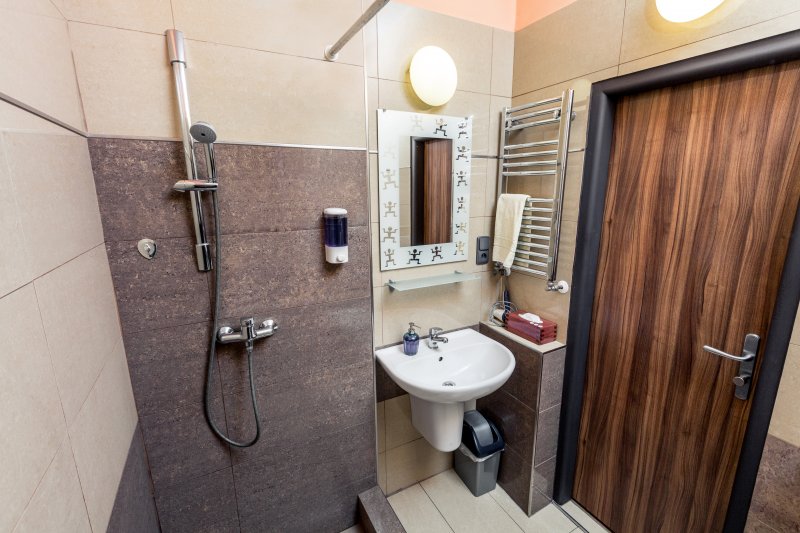 Triple room with a shared bathroom